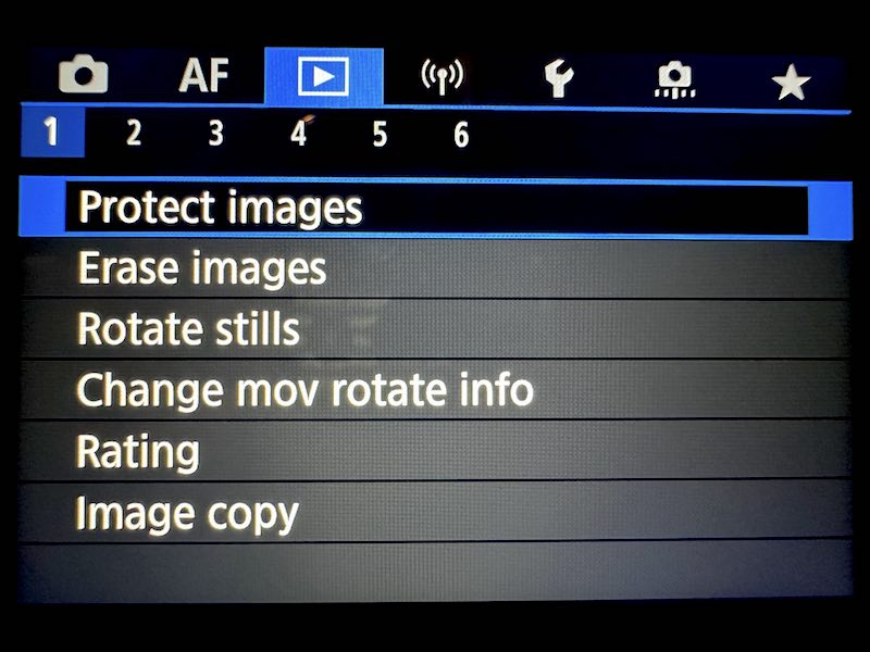Canon EOS R7 blue play button menu.
